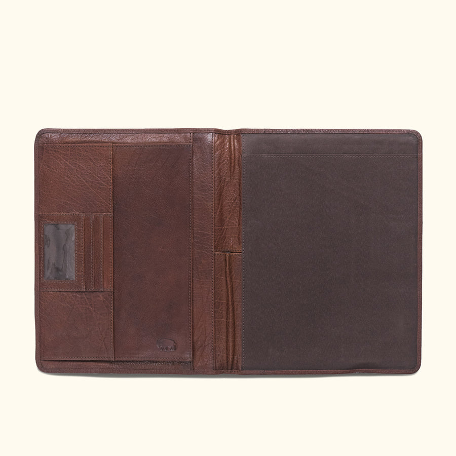 Elegant Roosevelt travel padfolio in rich buffalo grain leather with organizational pockets and sophisticated design.