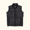 A sleek black leather puffer vest, perfect for layering in colder weather with its stylish and functional design.