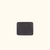 Dark oak Roosevelt leather slim ID wallet with visible stitching and embossed logo.