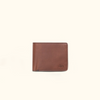 Amber brown Roosevelt leather billfold wallet with sleek design and fine stitching detail.